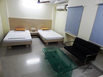 Bedroom Image of Sr Guest House in Ekkatuthangal