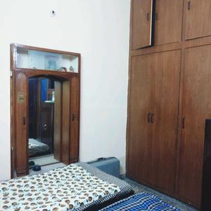 Bedroom Image of Mayank PG in Alipur Village