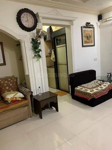 Gallery Cover Image of 625 Sq.ft 1 BHK Apartment for rent in Dharma Nagar Co-operative Housing Society, Borivali West for 23000