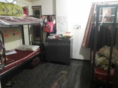 गणना भारती में रक्षा पीजी में बेडरूम की तस्वीर