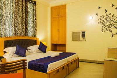 Bedroom Image of Queens Inn in Sushant Lok I