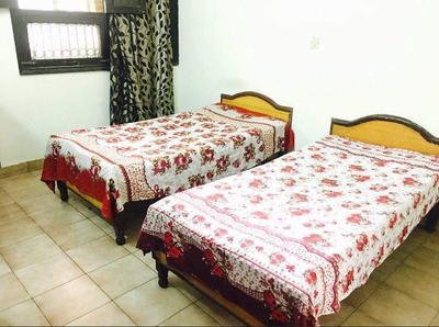 Bedroom Image of Nirvanaa Homes PG in Sarita Vihar