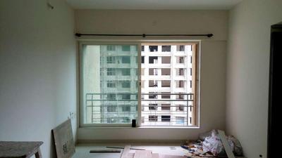Gallery Cover Image of 866 Sq.ft 2 BHK Apartment for buy in Malad West for 14900000