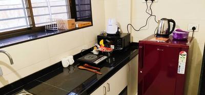 Kitchen Image of Casa Boutique Stays PG in Wadgaon Sheri