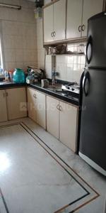 Kitchen Image of Astha PG Rooms in Kandivali East