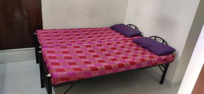 Bedroom Image of Kavimani Gents Hostel in Thoraipakkam