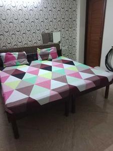 Bedroom Image of Naresh PG in Sector 57