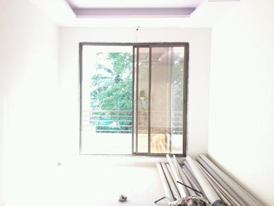 Gallery Cover Image of 869 Sq.ft 2 BHK Apartment for buy in Kalyan West for 4780000