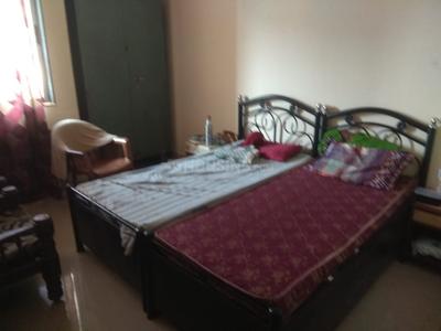 वाकड़ में नन्द पीजी के बेडरूम की तस्वीर
