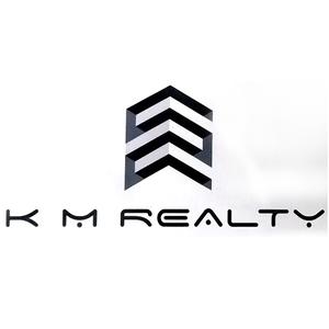 K M Realty logo