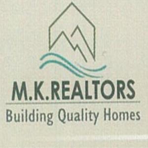 M K Realtors logo